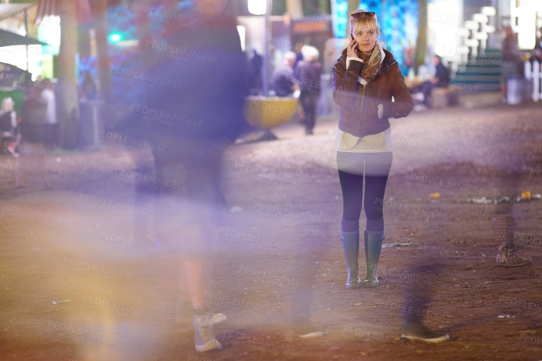 Buy stock photo Phone call, blur and woman in city at night, communication or listening to conversation. Smartphone, chat and person outdoor in urban street, connection or speaking to contact on digital mobile tech