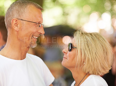 Buy stock photo Outdoor, event and senior couple with love, marriage and happiness with romance, festival and summer. Nature, man or woman with joy, bonding together and cheerful with relationship, break or sunshine