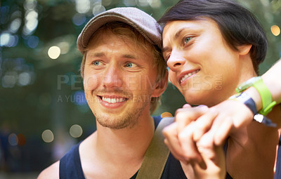 Buy stock photo Smile, love and couple holding hands outdoor in nature, care and loyalty, bonding and together on bokeh. Happy man, woman and support in healthy relationship, romance and connection, trust or date