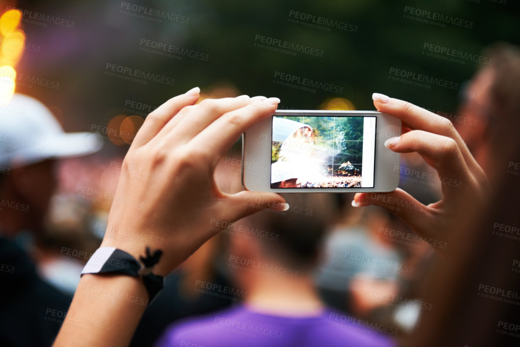 Buy stock photo Person, hands and music festival or cellphone picture or entertainment stage, party concert or crowd audience. Woman, fingers and mobile device at performance event, photography or dj celebration