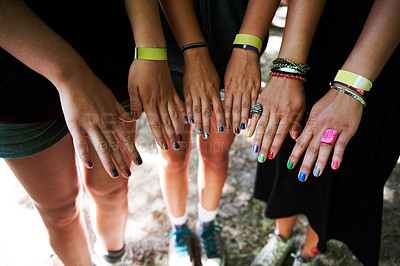Buy stock photo Hands, manicure and woman friends at music festival together, in a circle outdoor closeup from above. Party, concert or show with a group of people at a carnival for performance or entertainment