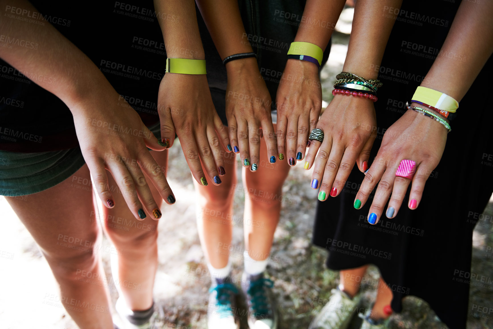 Buy stock photo Hands, manicure and woman friends at music festival together, in a circle outdoor closeup from above. Party, concert or show with a group of people at a carnival for performance or entertainment