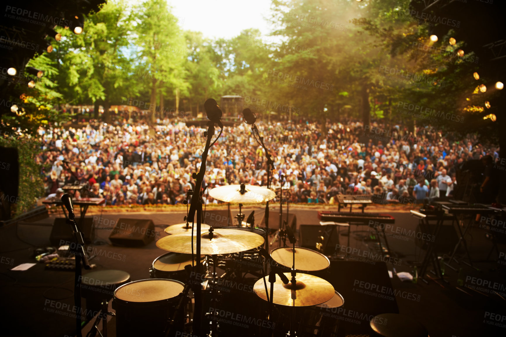 Buy stock photo Cropped shot of a musician's feet on stage at an outdoor music festival