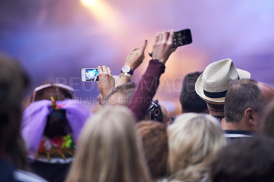 Buy stock photo People, festival and crowd in music concert, cellphones and audience for event, entertainment and back. Technology, fun and gathering for rock and roll, celebration and performance for live streaming