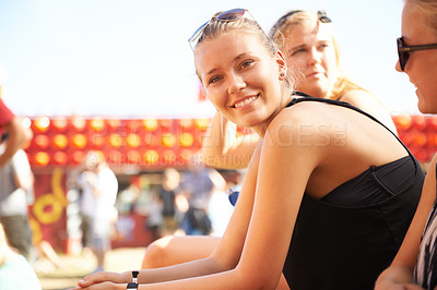 Buy stock photo Woman, portrait and smile at music festival with friends for relax at concert, audience crowd or carnival performance. Female person, face and happy with group at park party, outdoor event in summer