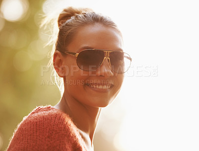 Buy stock photo Sunglasses, sunshine and portrait of woman in nature for holiday, summer vacation and adventure. Happy, smile and face of person outdoors with fashion accessory, trendy style and happiness in woods