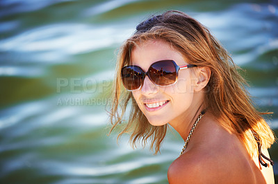 Buy stock photo Lake, portrait or happy woman in nature to relax with sunglasses, freedom or adventure in summer. Smile, paradise or female person in river water or dam for holiday travel, peace or outdoor vacation