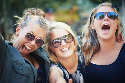 Buy stock photo Portrait, outdoor and women with music festival, dancing and nature with happiness, smile and cheerful. Face, people and friends with sunglasses, concert and energy with culture, environment and joy