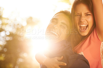 Buy stock photo Love, energy and portrait of happy couple in a park with piggyback, fun or bonding together. Freedom, face and excited people in a forest for back ride, support and adventure in the woods at sunset