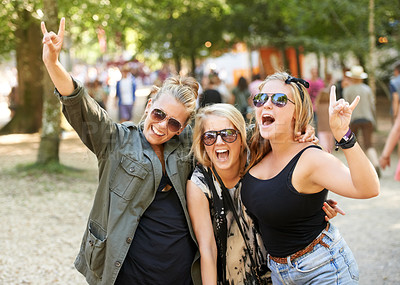 Buy stock photo Three girlfriend's partying at an outdoors music festival