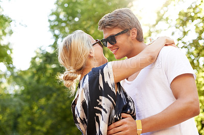 Buy stock photo Summer, hug and couple with love in forest, park or trees in woods for adventure on holiday or vacation. Happy, man and woman in embrace together with care, support and fun in nature or environment