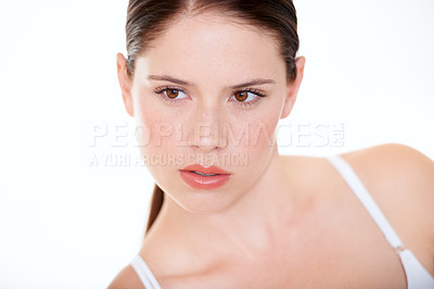 Buy stock photo A pretty young woman gazing intensely at something