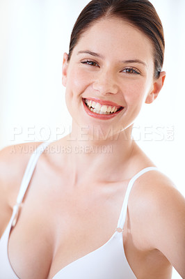 Buy stock photo Underwear, bra and happy portrait of woman with confidence in boobs in studio or white background. Sexy, lingerie and model with a smile for body positivity, fashion and self love in brassiere