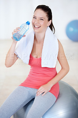 Buy stock photo Fitness ball, laughing or happy woman drinking water on break after exercise, workout or training in gym. Fatigue, tired or thirsty sports athlete with liquid bottle for wellness, rest or hydration