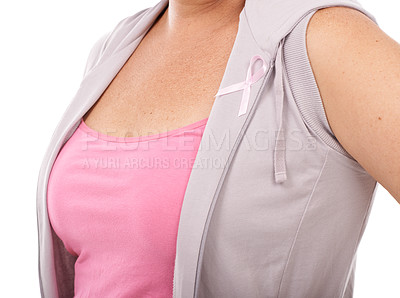 Buy stock photo Mature woman wearing a breast cancer awareness ribbon against a white background