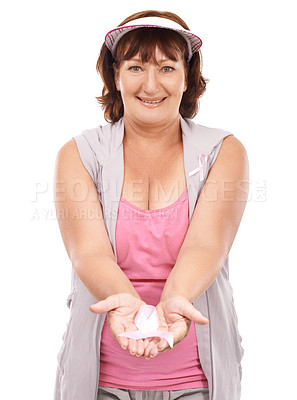 Buy stock photo Mature portrait woman, breast cancer ribbon and show studio bow for awareness, kindness or activism support. Health wellness care, disease survivor or person giving compassion on white background