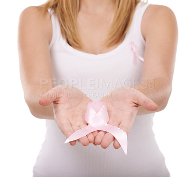 Buy stock photo Woman, hands and pink ribbon for breast cancer, support or awareness against a white studio background. Closeup of female person or blonde with symbol, bow or band for voice, start or launch campaign