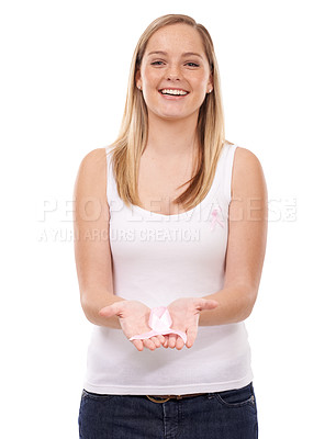 Buy stock photo Happy woman, portrait and ribbon for breast cancer, support or awareness against a white studio background. Blonde female person smile with pink bow or band to start campaign for launch in healthcare