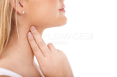 Buy stock photo Young woman taking her pulse rate against a white background