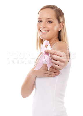 Buy stock photo A young woman with a breast cancer ribbon isolated on white