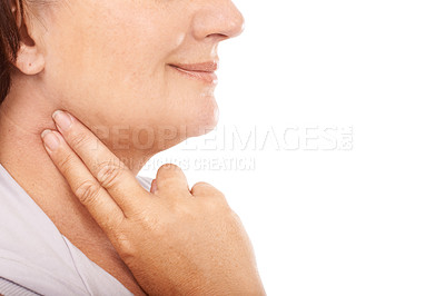 Buy stock photo Mature woman taking her pulse rate against a white background