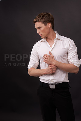 Buy stock photo Man, thinking and fashion confidence on black background for clothes outfit, cool style or formal dress up. Male person, edgy thoughts and model on mockup space for studio, event clothing or serious