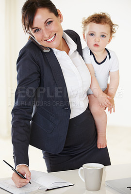 Buy stock photo Working, writing and mother with a baby, phone and notes on a call with client, discussion or multitasking in home. Mom, time management and care for child, business and professional career success