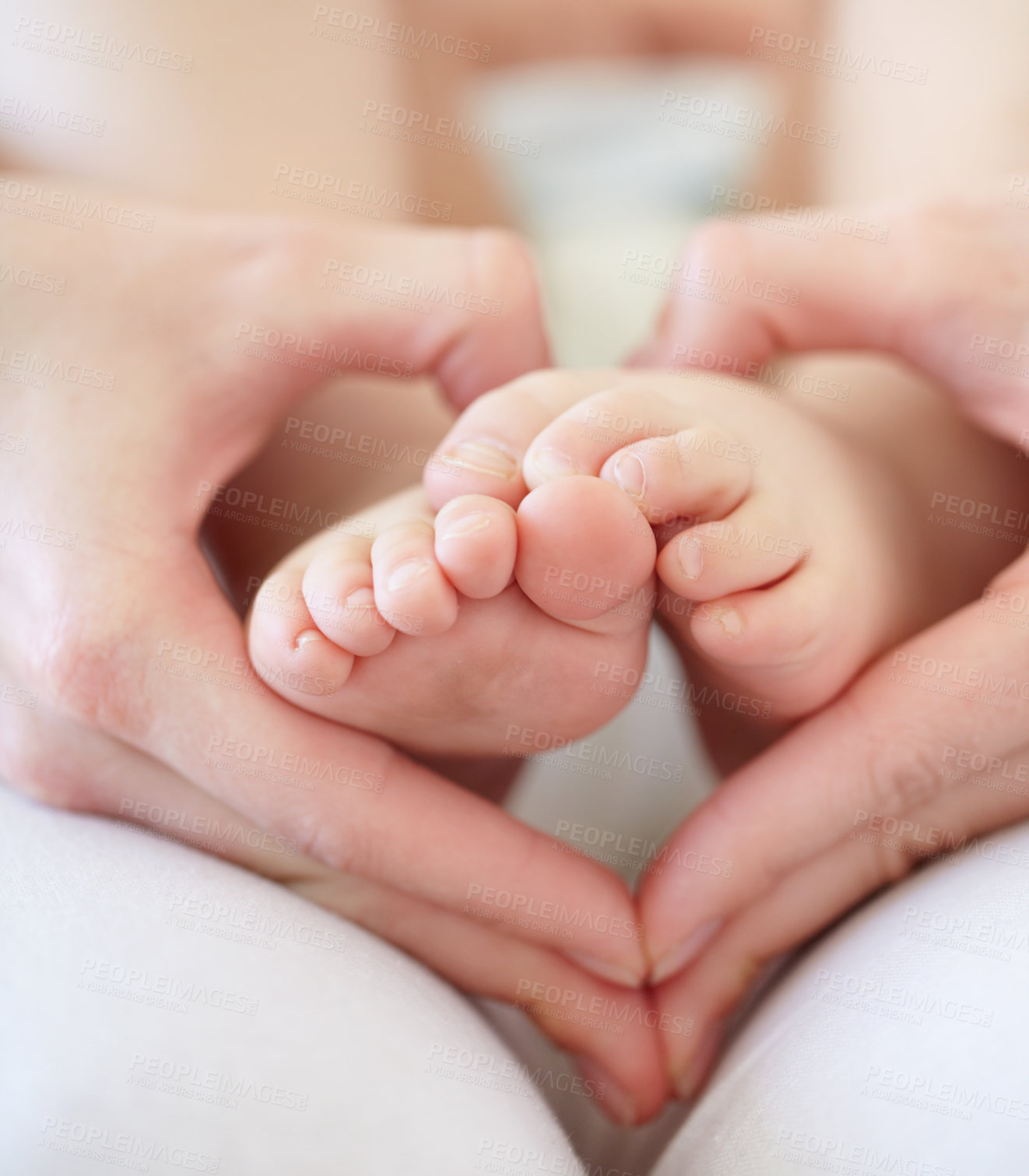 Buy stock photo Cropped shot of a mother holding her baby