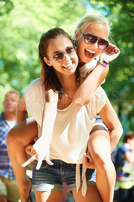 Buy stock photo Young teen friends having fun together in the sunshine