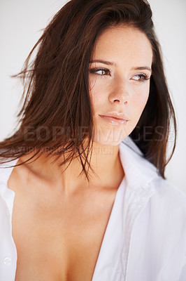 Buy stock photo Woman, thinking and confident in studio with fashion, edgy style and trendy outfit for aesthetic or shirt. Person, face and pride with thoughtful, contemplating or calm expression on white background