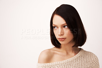 Buy stock photo Thinking, sweater and face of woman on a white background for fashion, winter style and trendy clothes. Confidence, natural beauty and person with shoulder jersey for cozy, comfort and warm in studio