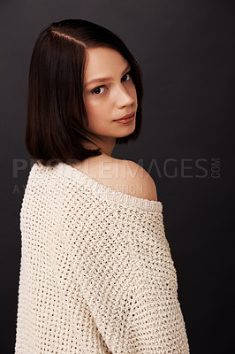 Buy stock photo Fashion, sweater and portrait of woman on black background for beauty, winter style or trendy clothes. Confidence, shoulder and face of natural person with jersey for cozy, comfort and warm in studio