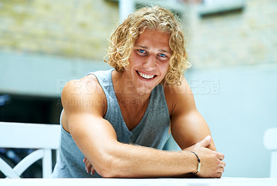 Buy stock photo Portrait of a handsome young man chilling outside