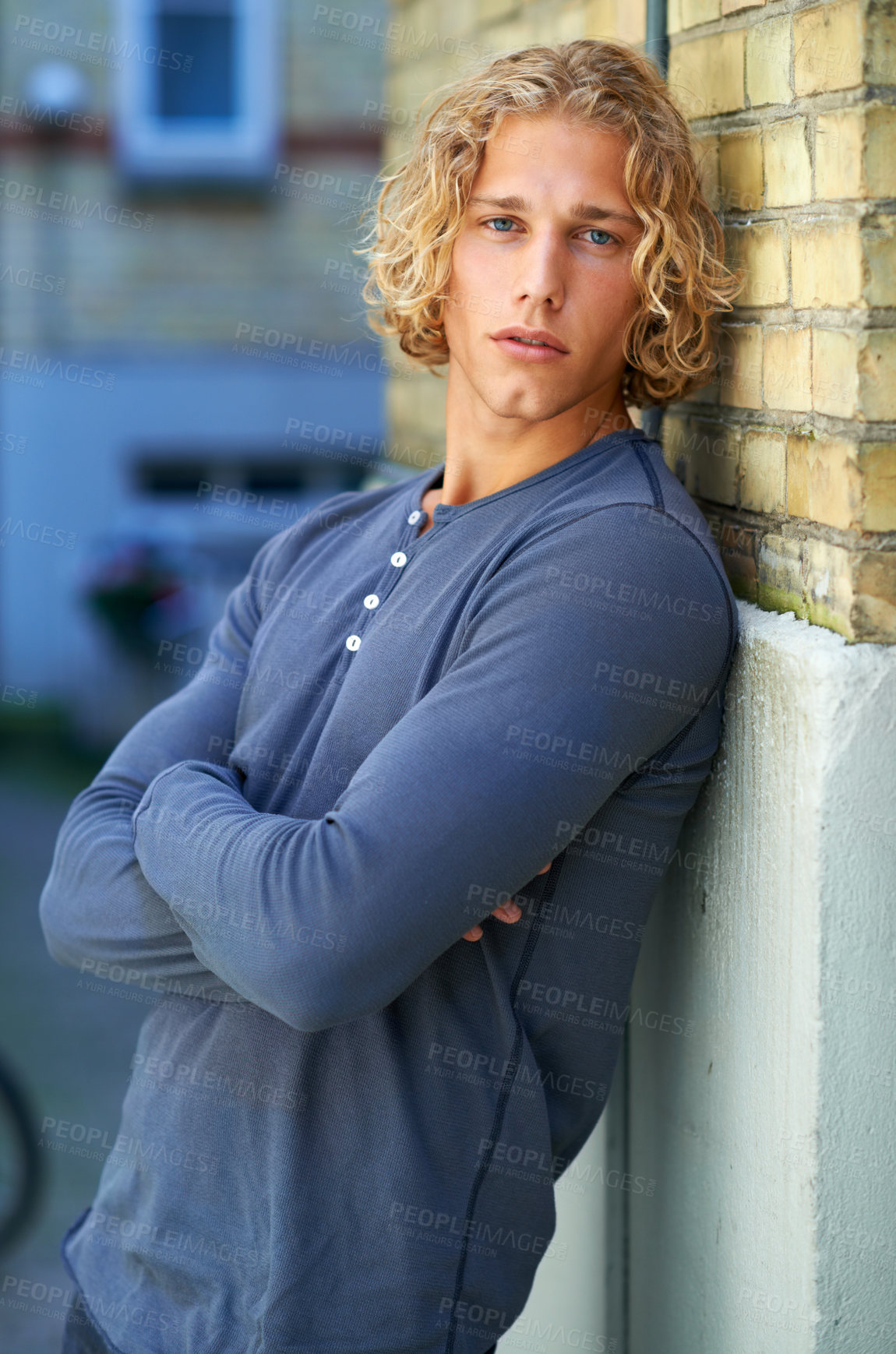 Buy stock photo Portrait of a handsome young man chilling outside