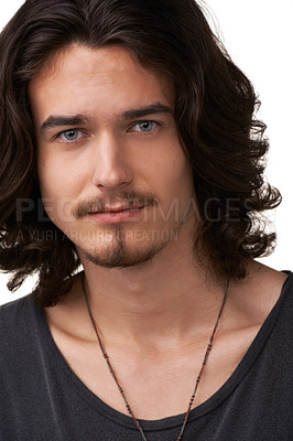 Buy stock photo Closeup of a handsome young man looking straight at the camera