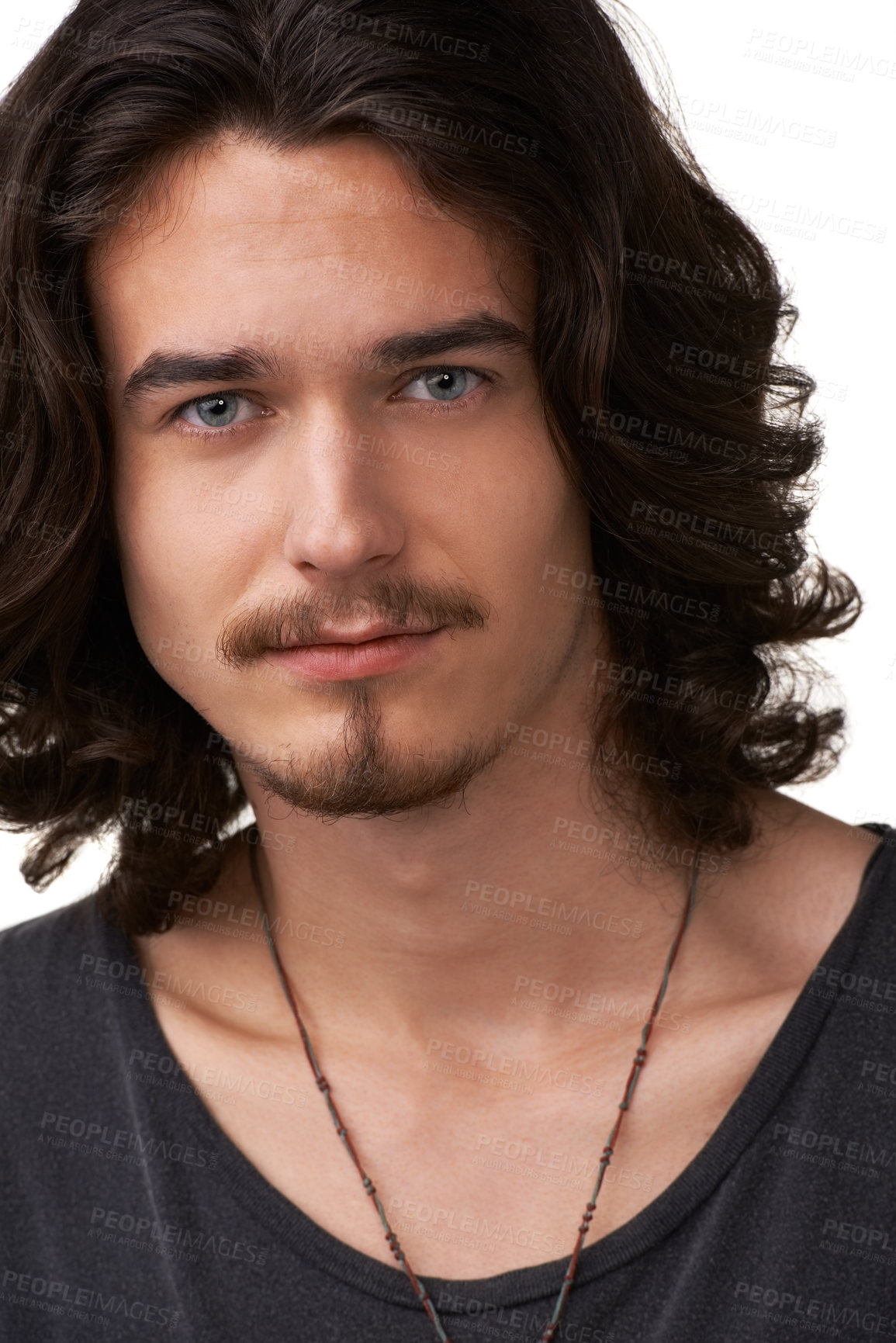 Buy stock photo Closeup of a handsome young man looking straight at the camera