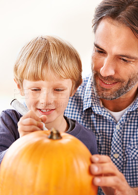 Buy stock photo Child, father and drawing on pumpkin for halloween, craft and celebrate party at home. Happy boy kid, dad and family writing with pen marker on vegetable for holiday lantern, decoration or creativity