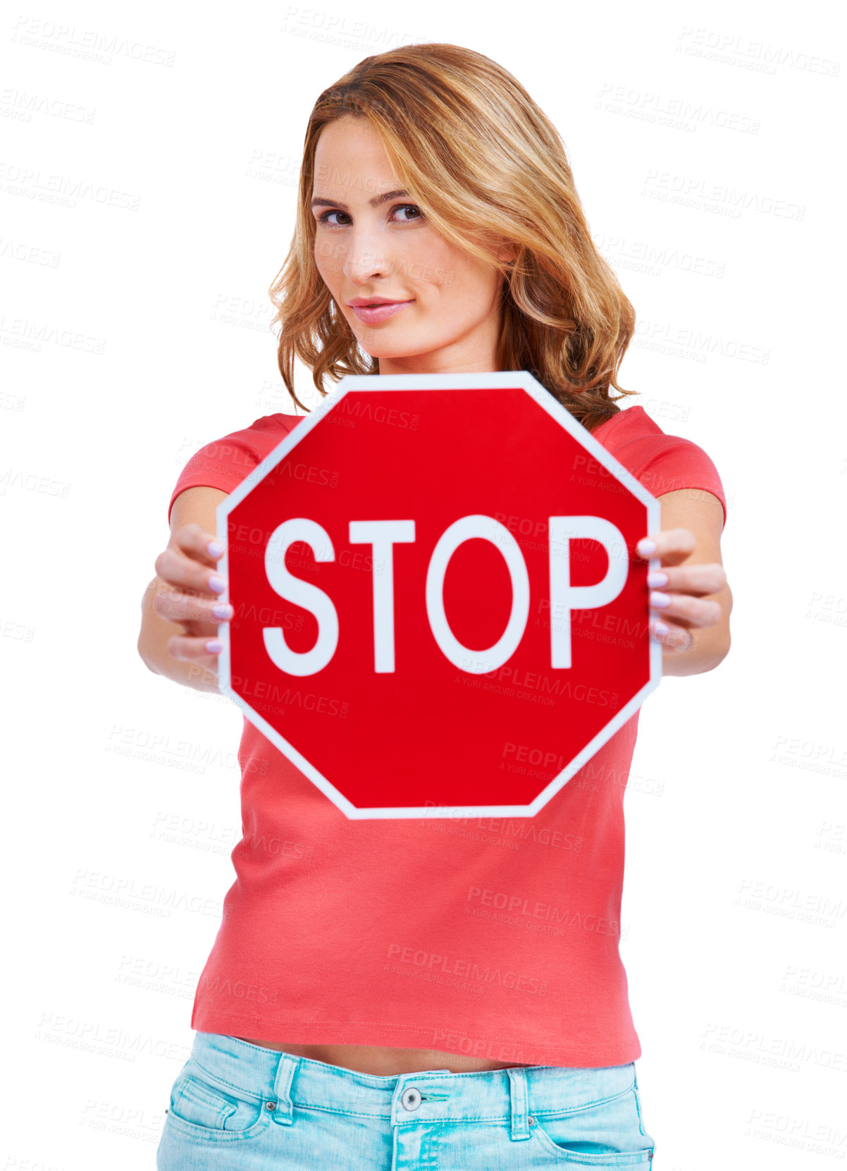 Buy stock photo A young woman holding a stop sign against a white background