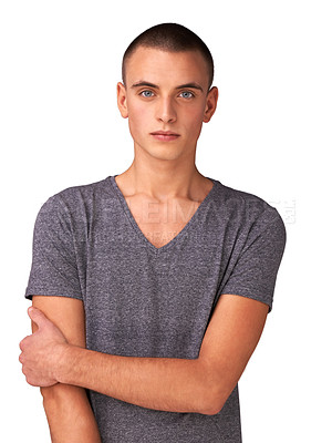 Buy stock photo Portrait, fashion and a confident young man in studio isolated on a white background for casual style. Model, tshirt and serious person looking trendy in a relaxed clothing outfit for a personality