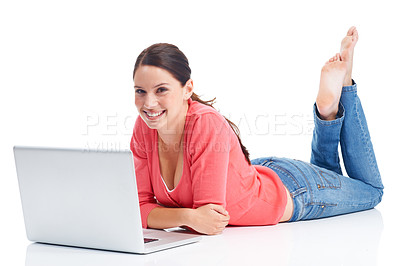 Buy stock photo Happy young woman relaxing while using her laptop