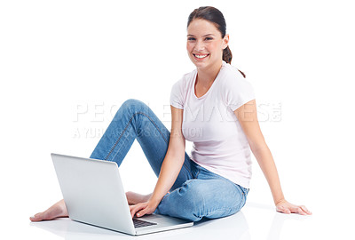 Buy stock photo Happy young woman sitting on the floor with her laptop