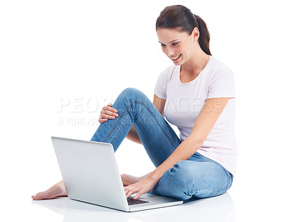 Buy stock photo Laptop, studio ground and happy woman typing internet, website or digital web search for e commerce research project. Online shopping, relax and model reading sales promo isolated on white background