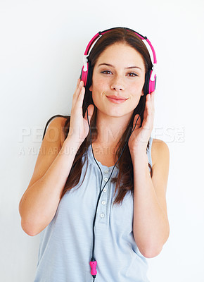 Buy stock photo Music headphones, portrait and happy woman listen to fun girl song, wellness audio podcast or radio sound. Studio smile, freedom and gen z model streaming edm playlist isolated on white background