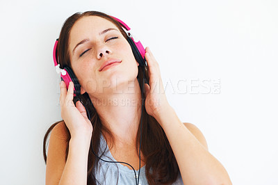 Buy stock photo Woman, peace and listening to music on headphones to relax with sound in white background of studio. Radio, podcast or person streaming a jazz, album or hear audio of song playing with technology