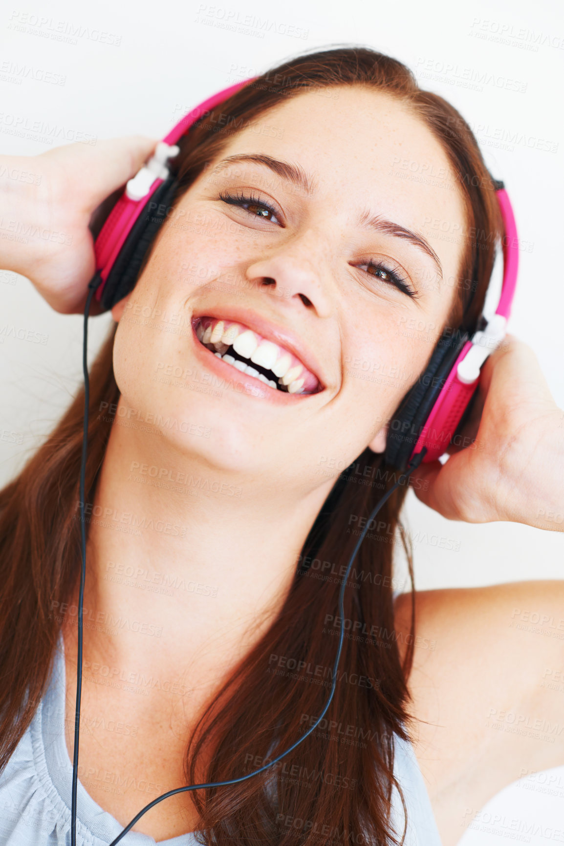 Buy stock photo Music headphones, happy face and woman portrait listening to fun girl song, wellness audio podcast or radio sound. Studio smile, freedom and model streaming edm playlist isolated on white background
