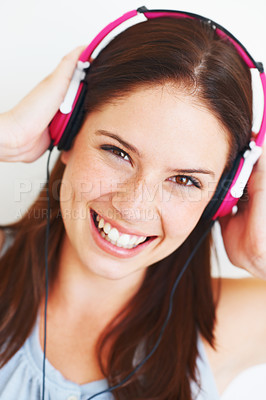 Buy stock photo Music headphones, face and woman portrait listen to fun girl song, wellness audio podcast or radio sound. Studio smile, freedom and happy model streaming edm playlist isolated on white background
