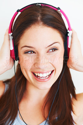 Buy stock photo Music headphones, studio face and happy woman listening to fun girl song, wellness audio podcast or radio sound. Smile, freedom and gen z model streaming edm playlist isolated on white background