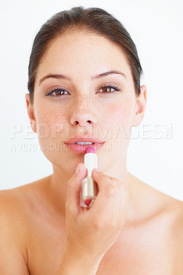 Buy stock photo Woman, face and lipstick for makeup, cosmetics or skincare isolated against a white studio background. Portrait of beautiful happy female applying cosmetic product on lips for beauty or self love