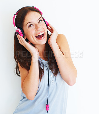 Buy stock photo Music headphones, excited and happy woman listen to fun girl song, wellness audio podcast or radio sound. Studio smile, freedom and gen z model streaming edm playlist isolated on white background
