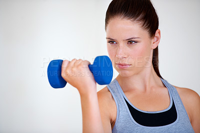 Buy stock photo Woman, thinking or serious with dumbbells in studio, health wellness or fitness for weight loss with exercise. Young person, commitment or vision with hand weights for strong body or white background